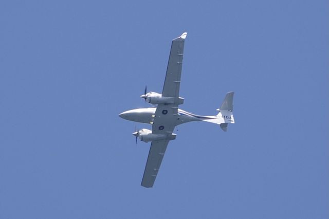 Diamond Twin Star (N141DA) - Flying over Fitchburg