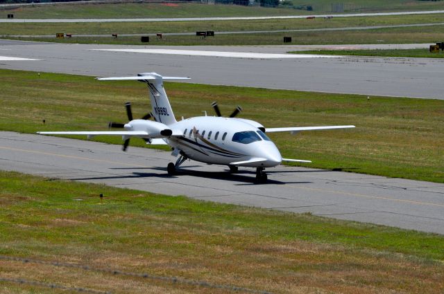 Piaggio P.180 Avanti (N188SL) - Piaggio P.180 Avanti taxiing on taxiway bravo at Hickory Regional Airport.