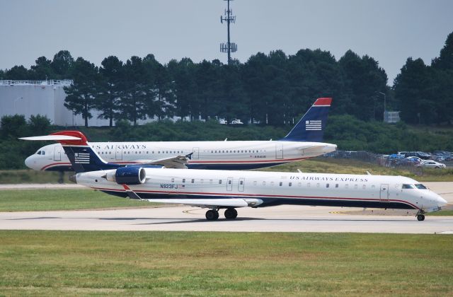 Canadair Regional Jet CRJ-900 (N923FJ) - Rolling 18C - 7/15/10