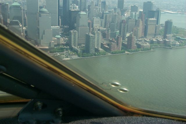 Lockheed Jetstar 2 (N313JS) - 1100ft VFR southboud (took a pic of my folks apartment) WTC in back