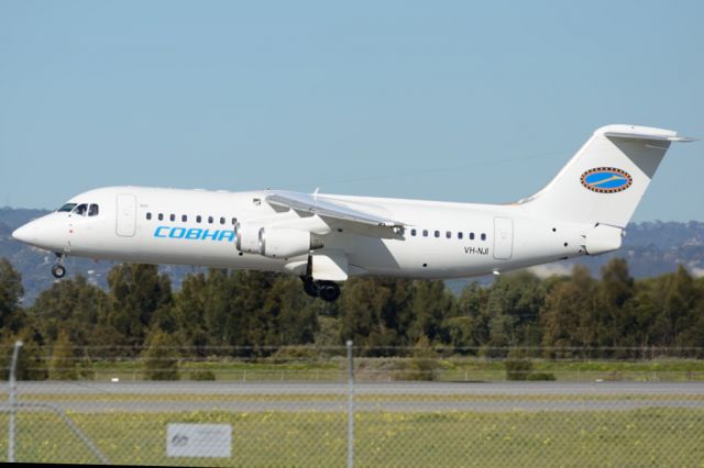 Avro RJ-100 Avroliner (VH-NJI) - About to put down on runway 05. Tuesday 22nd July 2014.