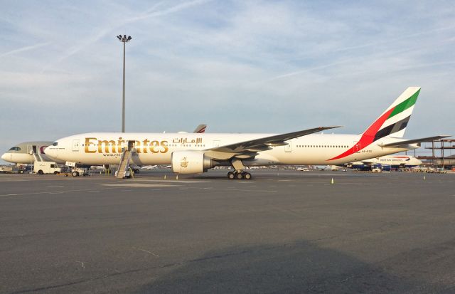 BOEING 777-300ER (A6-ECG) - Emirates B777-300ER waiting to get towed to gate C17