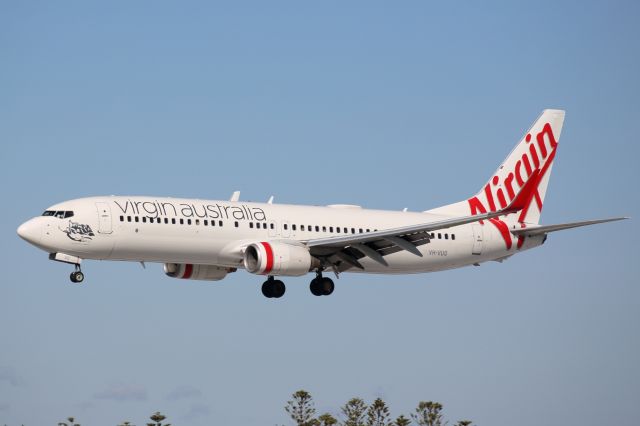 Boeing 737-700 (VH-VUQ) - On short finals to runway 05. Landing as VA1390 from Brisbane.