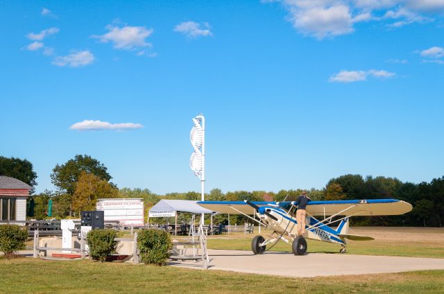 Piper L-21 Super Cub (N1473C) - Gassing up the Super Cub on a perfect fall flying day here in New England.