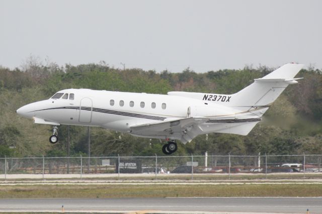 Hawker 800 (N237DX) - N237DX arrives on Runway 32 at Sarasota-Bradenton International Airport