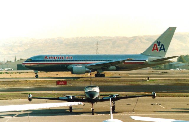 BOEING 767-200 (N322AA) - KSJC - AA 767 200 - 22323/140 built in June 1986, lined up on 30 L.- I do not remember where the 767 was headed but it as a daily flight for several months.