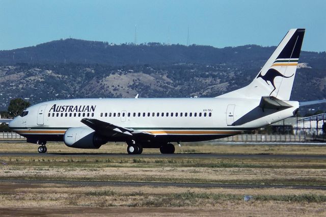 Piper Cherokee (VH-TAJ) - AUSTRALIAN AIRLINES - BOEING 737-376 - REG : VH-TAJ (CN 23484/1270) - ADELAIDE INTERNATIONAL AIRPORT SA. AUSTRALIA - YPAD 21/2/1988 35MM SLIDE CONVERSION USING A LIGHTBOX AND A NIKON L810 DIGITAL CAMERA IN THE MACRO MODE.