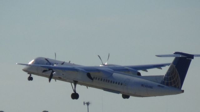 de Havilland Dash 8-400 (N341NG) - Departing runway 23R.