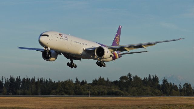 BOEING 777-300 (HS-TKQ) - BOE277 from KARA on final to Rwy 34L on 8/13/13. (LN:1129 cn 41526). The aircraft was returning after being painted.