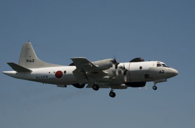 Lockheed P-3 Orion — - Short final at RJOI.