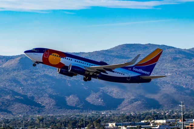 Boeing 737-700 (N230WN) - Southwest Airlines 737-700 in Colorado One special livery taking off from PHX on 10/22/22. Taken with a Canon 850D and Tamron 70-200 G2 lens.