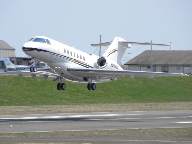 Hawker Beechcraft 4000 (N699AK) - N699AK leaving KBLM on 32