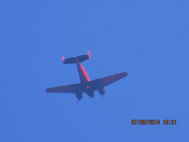 Beechcraft 18 (N9109R) - Matt Younkin Beech Craft 18 coming from Offutt AFB over Baxter Springs KS at 9,400 feet.