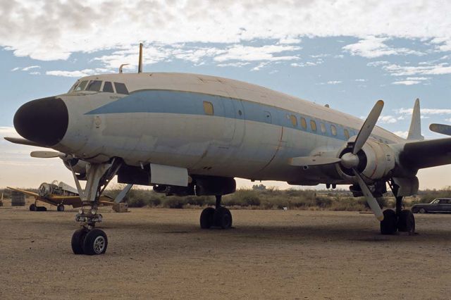 Lockheed EC-121 Constellation (N73544) - Lockheed C-121C N73544 at the Gila River Indian Reservation Memorial Airport on December 30, 1981. Its Lockheed construction number is 4175. It was delivered to the Air Force as 54-0156 on November 1, 1955. The Smithsonian Institute acquired it from storage at Davis-Monthan AFB, Arizona in June 1972 in order to trade it to Aviation Specialties for the Boeing 307 Stratoliner, N19903 Clipper Flying Cloud. Aviation Specialties registered it as N73544 in March 1973 and retired it in 1976. Globe Air Inc. bought it in February 1981 and sold it to Mehrdad Khoramian in December 1982. It was registered to Daryoush Younesi at Tarzana in 1992. It spent several years based at Camarillo,California. It has been exported to Switzerland by the Swiss Super Constellation Group. It departed from the Camarillo Airport on April 26, 2004. It flew as the Breitling Super Constellation HB-RSC, but Breitling withdrew their sponsorship. It has not flown for some time. The Super Constellation Flyers Association hopes to have it back in the air next year.