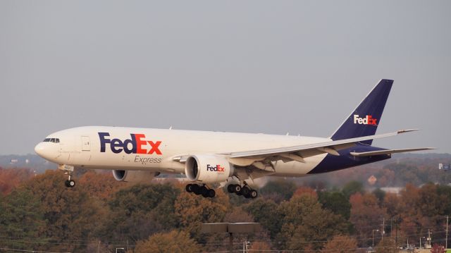 BOEING 777-200LR (N868FD) - "Joseph" on short final to 18R.