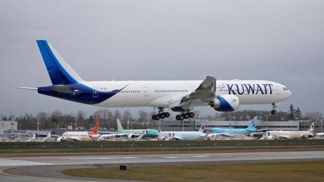 BOEING 777-300 (9K-AOE) - BOE778 from KPDX on short final to Rwy 16R on 12.29.16. (ln 1463 / cn 62563). The aircraft was returning after being painted. 