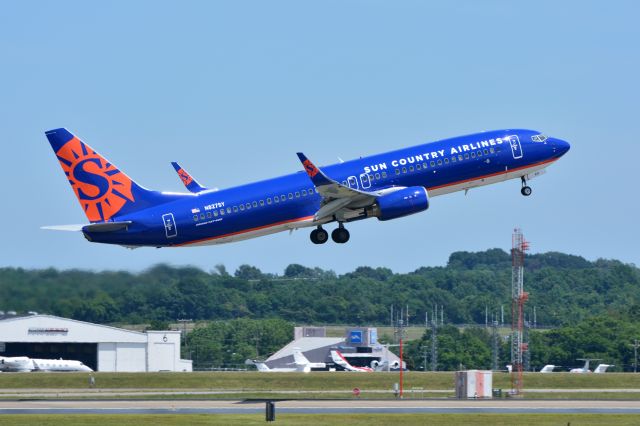 Boeing 737-800 (N827SY) - A Sun Country Boeing 737-8F2 departs Nashville Tennessee on a beautiful June day.br /06/14/2019 