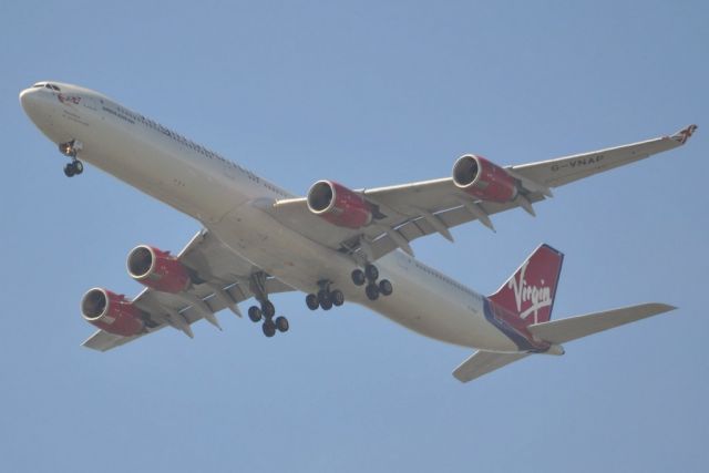 Airbus A340-600 (G-VNAP) - On approach to London Heathrow, over Windsor Castle. Wed.5th June 2013.