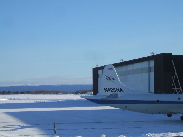 Lockheed P-3 Orion (N426NA) - Parked  in front of Hangar at Goose Airport NL.  Feb 16/09