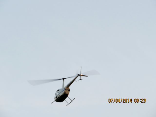 Robinson R-22 — - Duck Creek at Grand Lake Oklahoma small airshow before the biggest fireworks show in the Midwest.