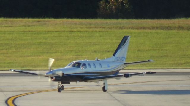 Socata TBM-700 (N227CH) - Turning off runway 23R.