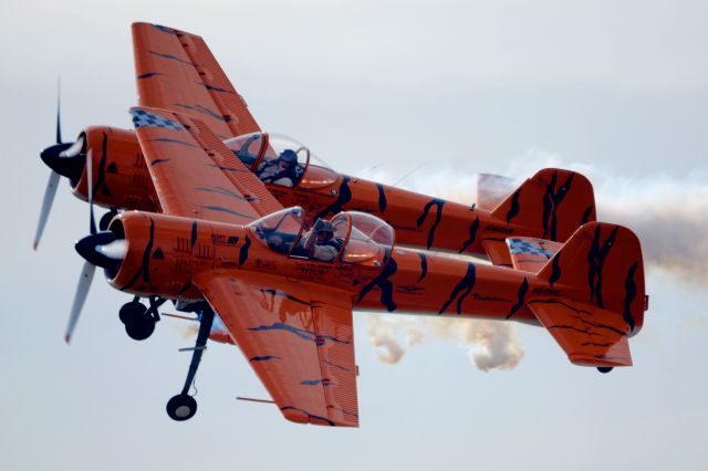 — — - Twin Tiger Aerobatic Team Buck Roetman and Mark Sorenson in two identical Tiger Yak 55’s at the 2013 Stuart, FL Airshow.