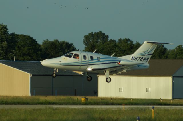 Eclipse 500 (N678PS) - Taken on the Corporate Ramp.  EA50 coming in for landing.