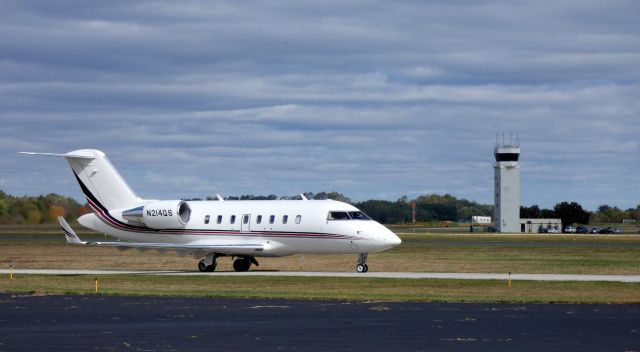 Canadair Challenger (N214QS) - Taxiing to the terminal is this 2016 Bombardier Challenger 650 in the Autumn of 2019.