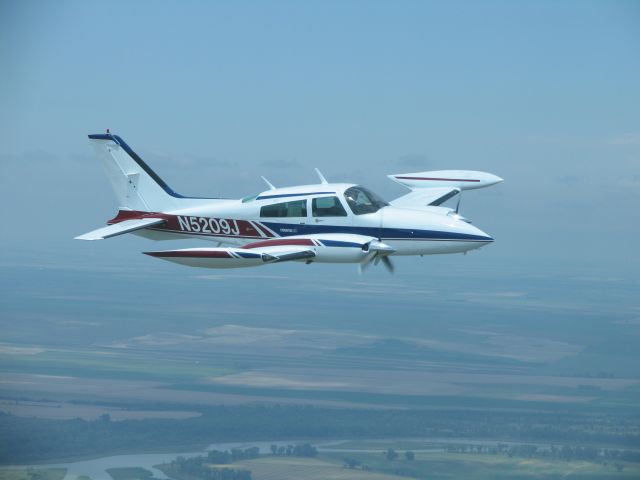 Cessna 310 (N5209J) - Coming home to Montana with new paint from Vanco Aviation in Hazen ND and new interior from Exec Air in Bismarck ND.  They are the BEST!!!