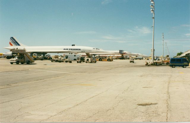 — — - 3 Concordes parked at Adams International airport Barbados