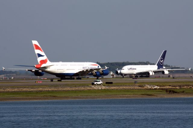 Airbus A380-800 (D-AIMK) - Lufthansa A380 arrival to BOS on 6/1/23 while British Airways A380 taxi's to its gate. 