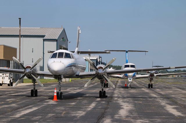 Fairchild Dornier SA-227DC Metro (N544UP) - Turboprops at Toledo. N544UP and N718AF, a Beech 1900C, on the ramp at KTOL on 27 Jun 2019.