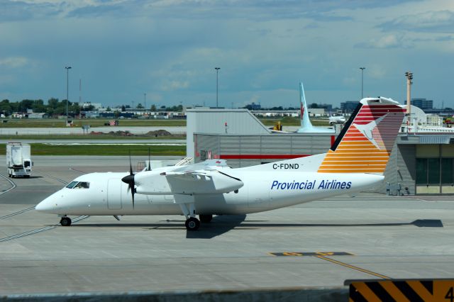 de Havilland Dash 8-200 (C-FDND) - Bombardier Dash8-100 getting ready for departure at Montreal airport