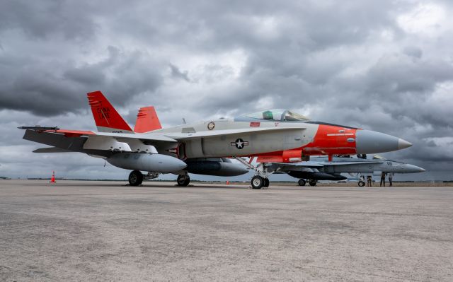 McDonnell Douglas FA-18 Hornet (16-5210) - Rare China Lake FA18s sit under stormy skies at KEFD on 14 April 2023