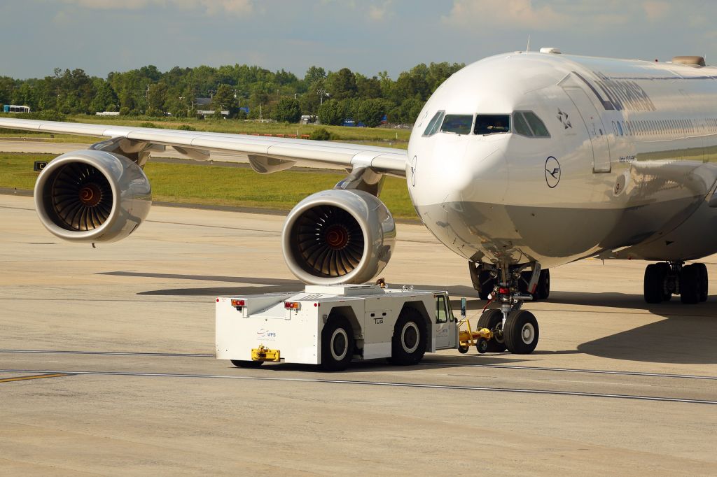 Airbus A340-600 (D-AIHY) - Pushback for evening flight from Charlotte, North Carolina USA to Munich, Germany