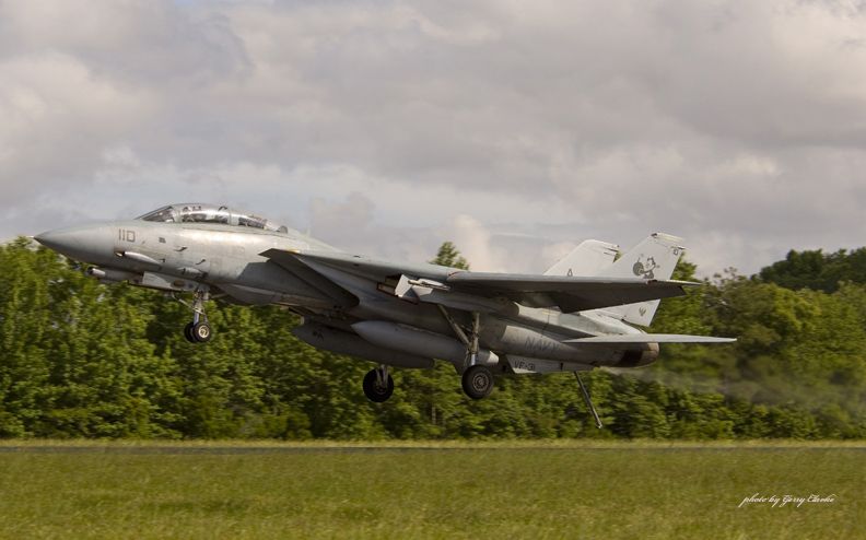 Grumman F-14 Tomcat (UNK) - Vice Admiral James A Winnefeld Jr or as he was known on the set of Top Gun Lt James Jaws Winnefeld makes and emergency landing at Fentres Field in Virginia Beach.  Note the trail of hydraulic fluid.  An all to common event with the Tomcat.