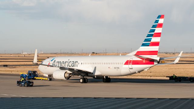 Boeing 737-800 (N871NN) - American Airlines Boeing 737-800 being towed from the gate to make room for an arriving Airbus A321