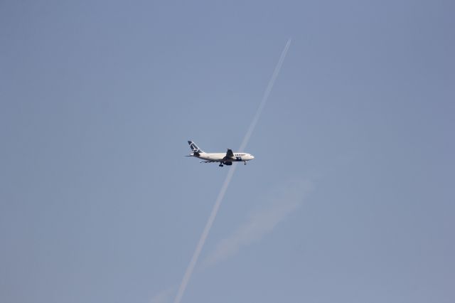 Airbus A310 (I-RLCA) - IR-LCA turning before landing at Henri Coanda airport as seen from the Moara Vlasiei forest.