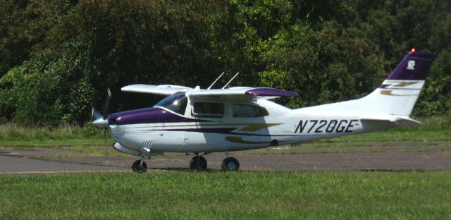 Cessna Centurion (N720GE) - Taxiing for a departure is this 1975 Cessna 210L Centurion in the Summer of 2023.