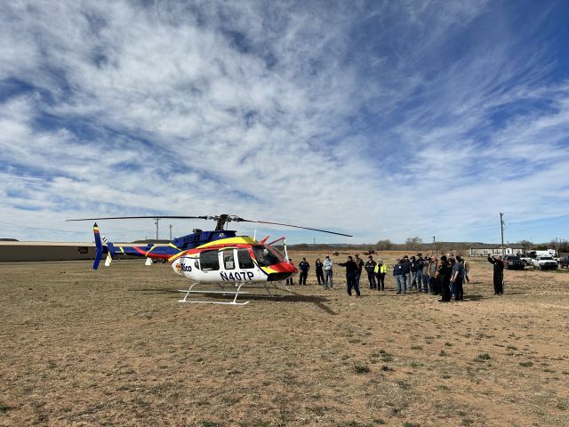 Bell 407 (N407P) - RICO 3 crew demonstrating helicopter landing zone safety to local first responders.