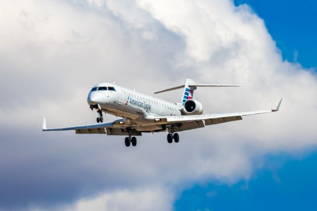 Canadair Regional Jet CRJ-700 (N748SK) - A SkyWest CRJ700 landing at PHX on 2/28/23. Taken with a Canon R7 and Canon EF 100-400 L ii.