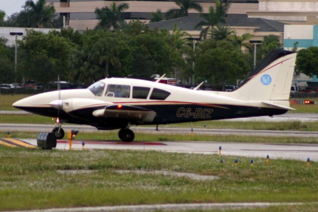 Piper Aztec (C6-BIZ) - Lining up to depart rwy 9 on 27-Nov-17.