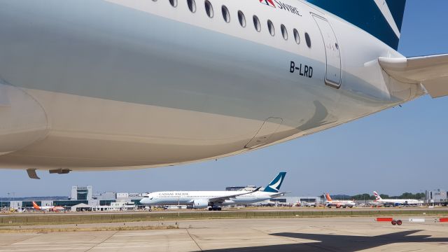 Airbus A350-900 (B-LRD) - BLRA in the background 