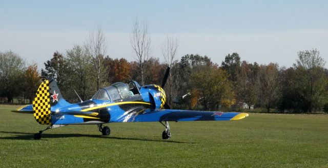 YAKOVLEV Yak-52 (N452TW) - Taxiing for departure is this 2002 Yakovlev-Aerostar YAK-52TW in the Autumn of 2022.