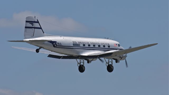 Douglas DC-3 (N877MG) - Historic Flight Foundationss Douglas DC-3 (Ser#4193) on final to Rwy 16R on 7/18/13.