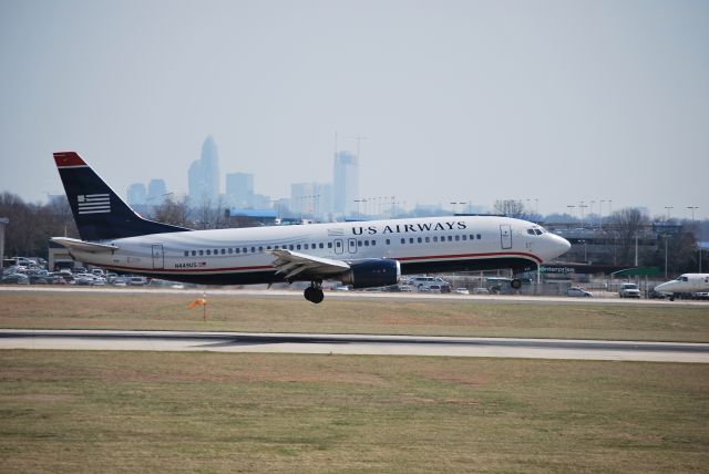 BOEING 737-400 (N449US) - Approaching runway 18C - 3/11/09