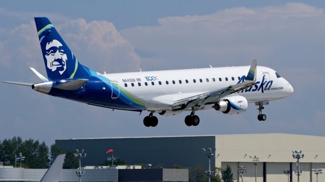 Embraer 175 (N643QX) - QXE2121 from KLAS on final to Rwy 16R on 8.7.19. (ERJ-175LR / cn #17000763).