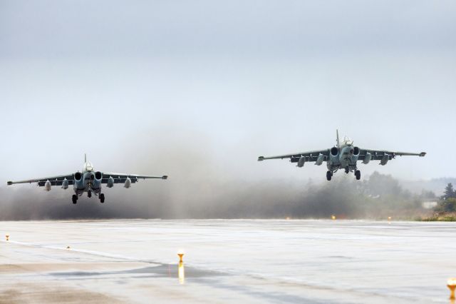 — — - Russian Sukhoi Su-25 fighter jets take off as part of the withdrawal of Russian troops from Syria at Hmeymim airbase, Syria, March 16, 2016. (Photo by Vadim Grishankin/Reuters/Russian Ministry of Defence)