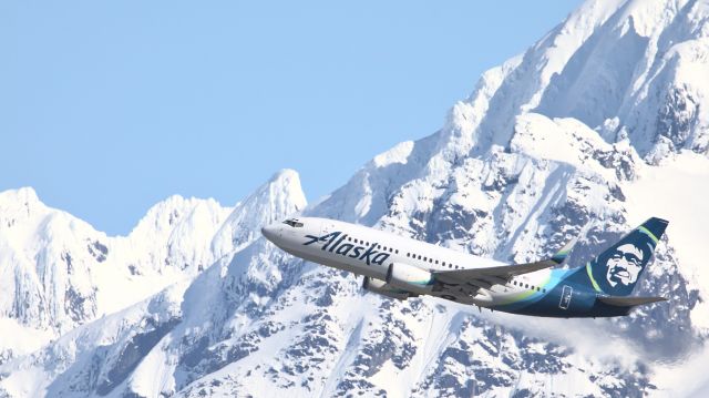 Boeing 737-700 (N613AS) - Departing Juneau for Yakutat.  I usually don't have a good angle on departing aircraft since they climb out so steeply.  But today things worked out for flight 61 outbound.  You can't see the registration number, I had to look up the flight and find the registration number from there.