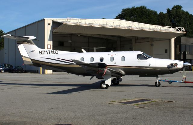 Pilatus PC-12 (N717NC) - If a 2006 Pilatus PC-12/47 is being towed across the road, why not take a photo of it! Photo taken on 7/2/2020.